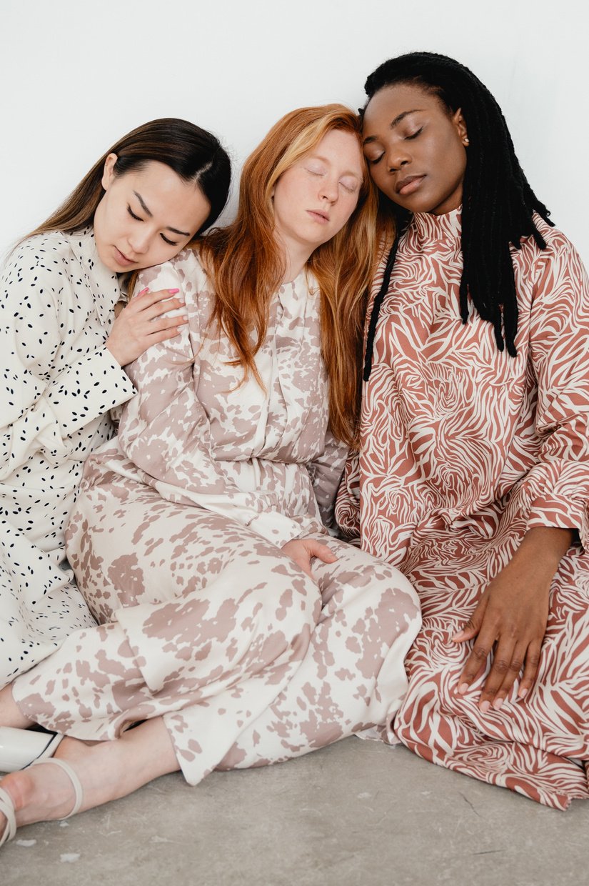 2 Women in White and Red Floral Robe